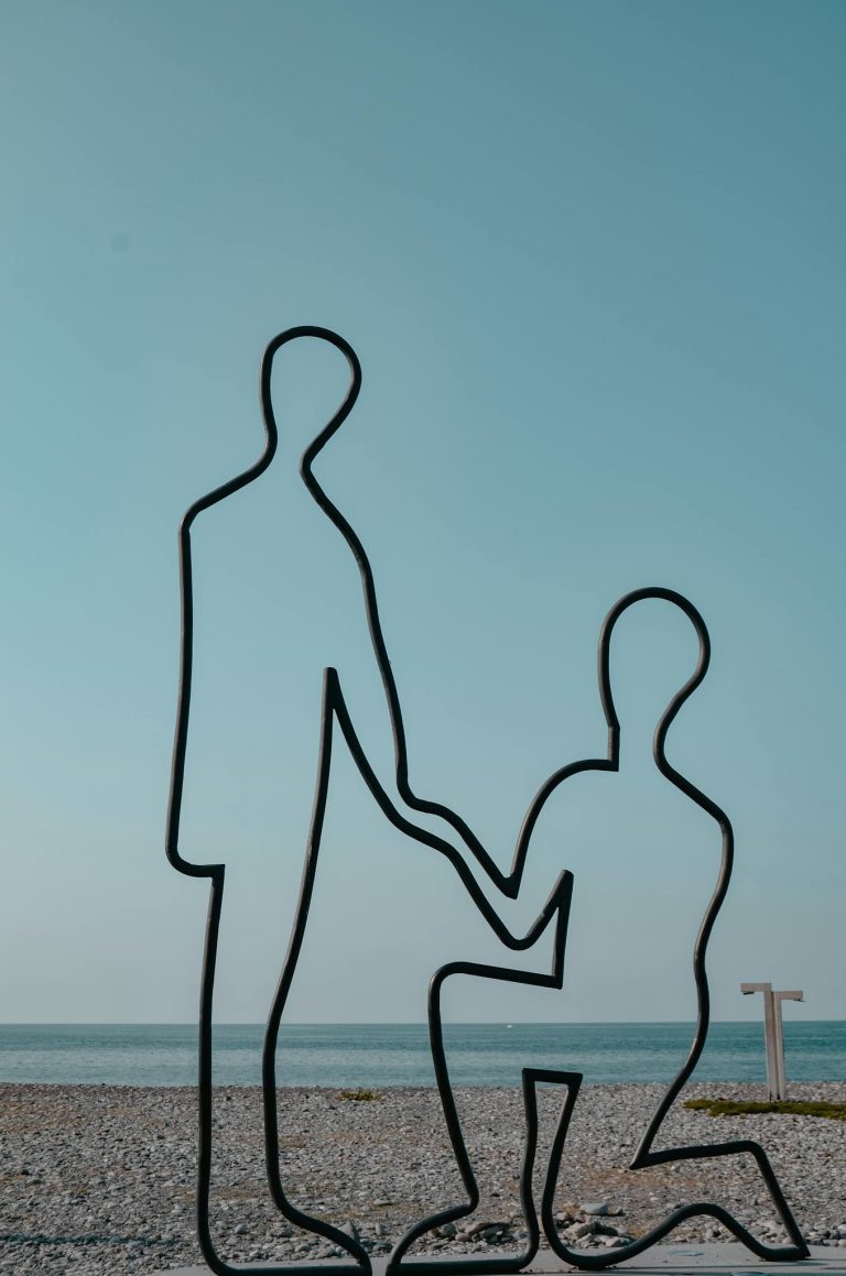 Minimalist sculpture by the sea in Ankara, Türkiye, capturing modern art against a serene summer backdrop.